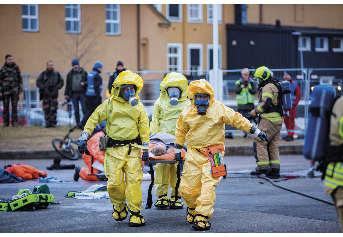 Figure 4.12 Local emergency services and the rescue service practice a nuclear incident in Norway.