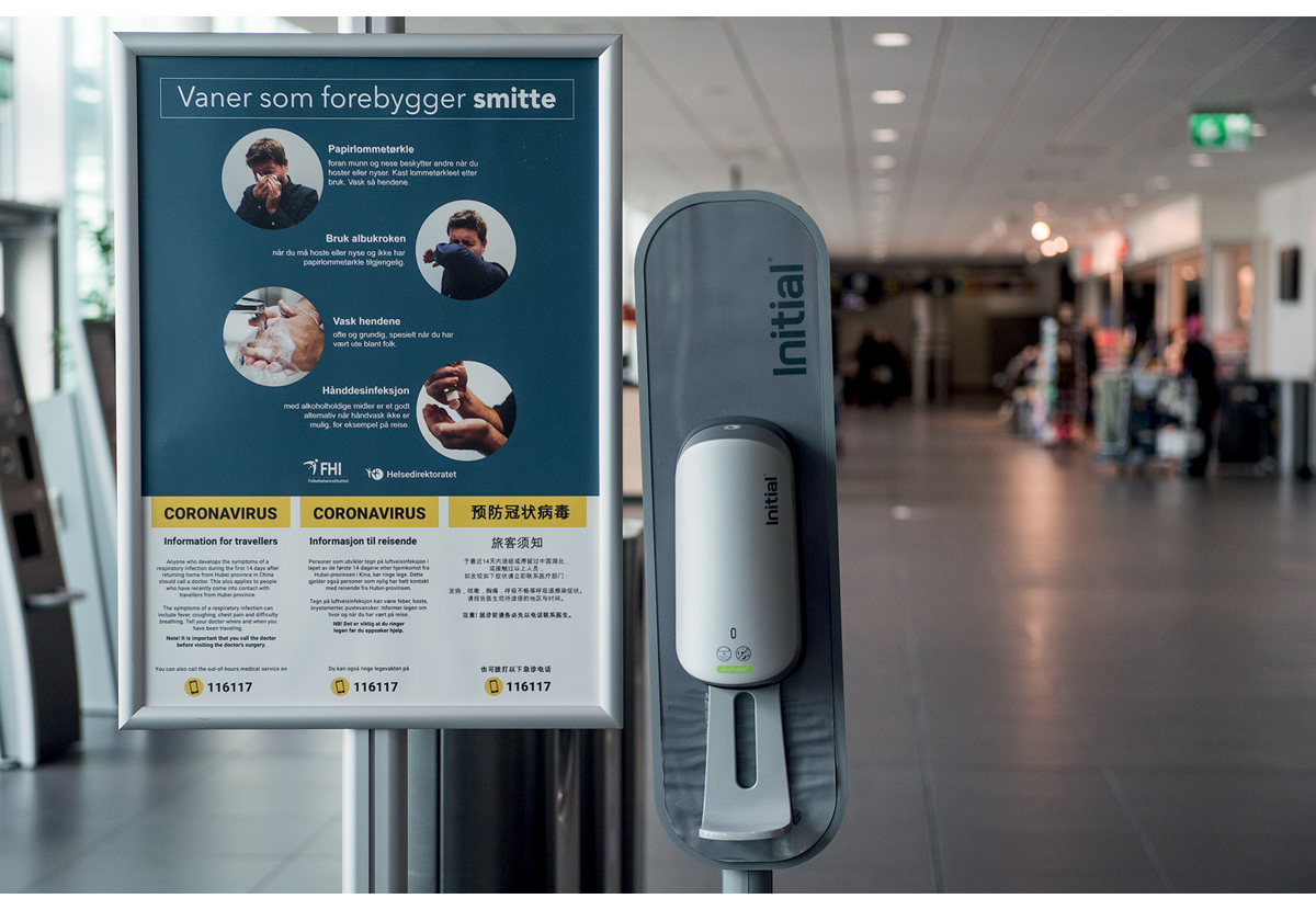 Figur 10.11 Smittevernplakat på ulike språk.